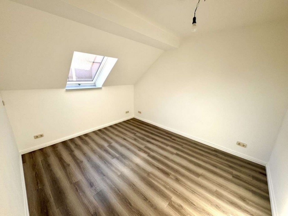 Schlafzimmer 2 Dachgeschosswohnung Ballenstedt