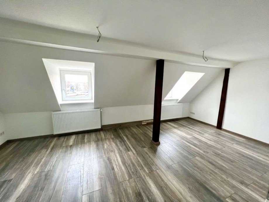 Wohnzimmer WE Dachgeschoss Mehrfamilienhaus Halberstadt