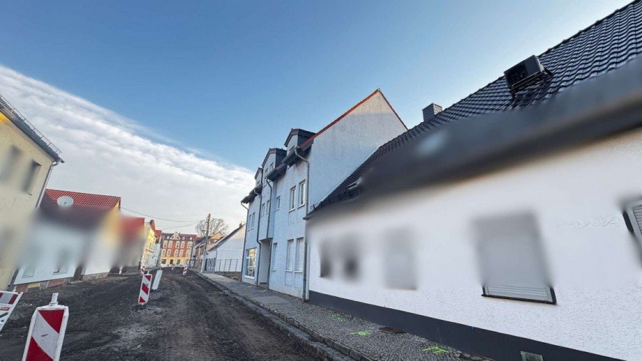 Vorderansicht Mehrfamilienhaus Sta�furt