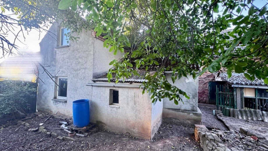 nR�ckseiteGiebelHof Einfamilienhaus K�nnern